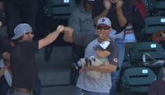 San Francisco Giants Fan Catches Foul Ball Whilst Holding Baby [Video]