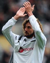 Newcastle ace Fabricio Coloccini being chased by San Lorenzo